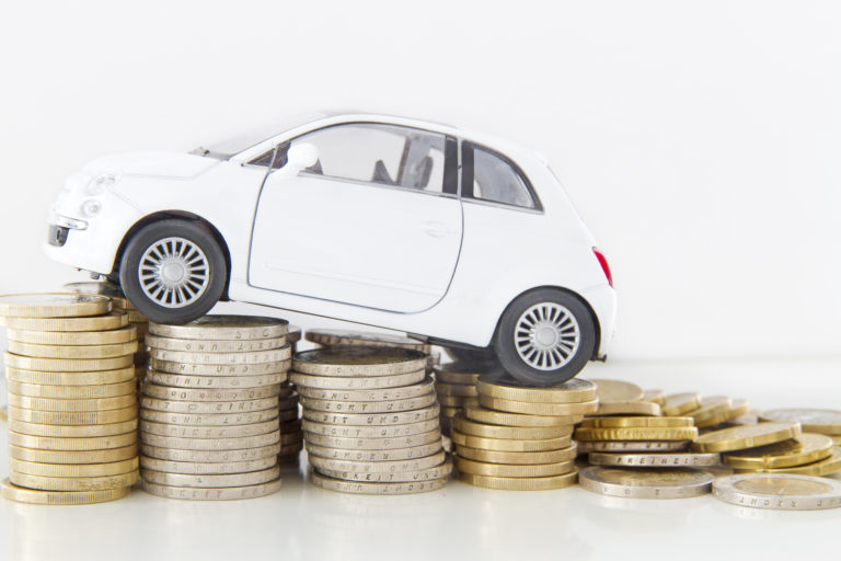 MSP parking rates feature image of a car on coins.